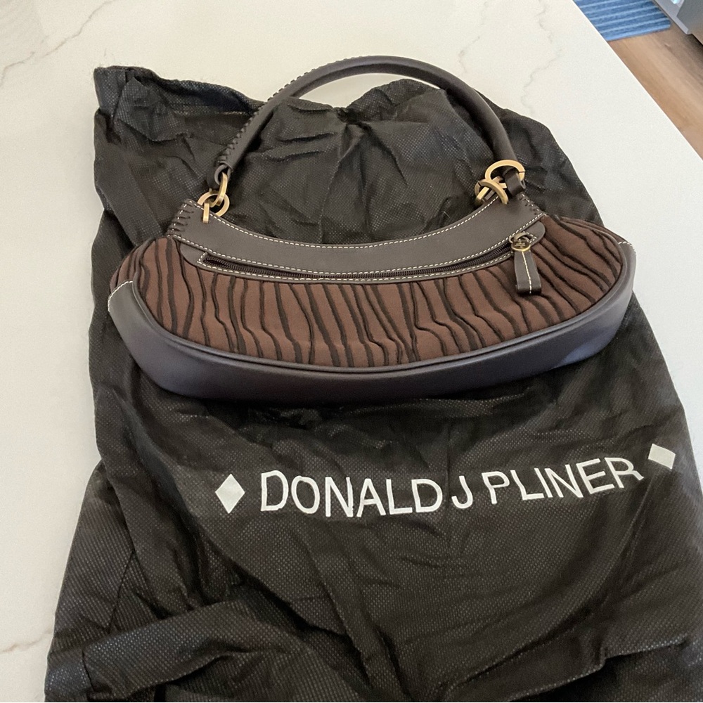NWOT DONALD PLINER BROWN AND BLACK SMALL PURSE.